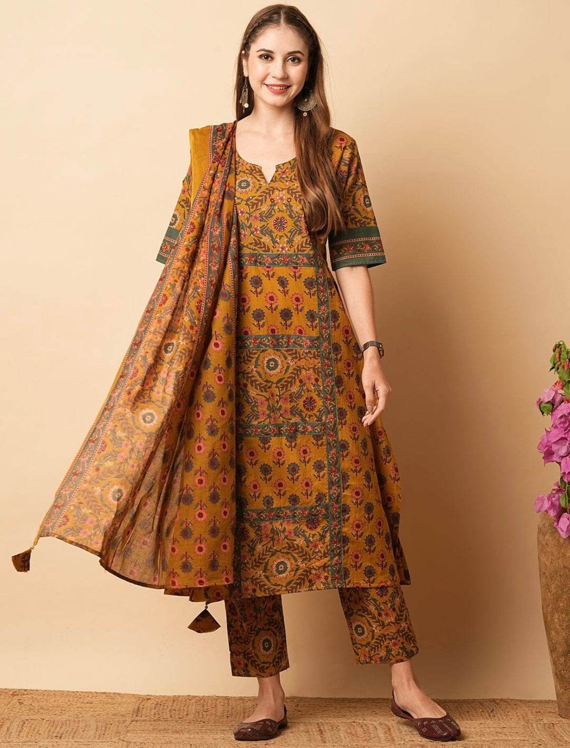 Mustard yellow floral printed panelled beads cotton kurta set - Eraya