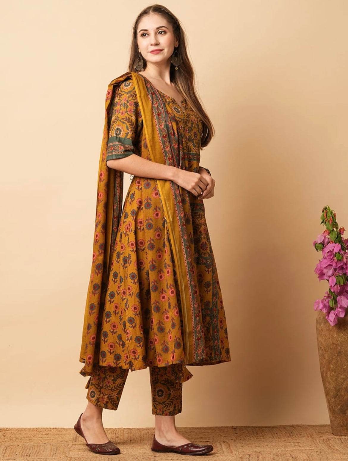 Mustard yellow floral printed panelled beads cotton kurta set - Eraya