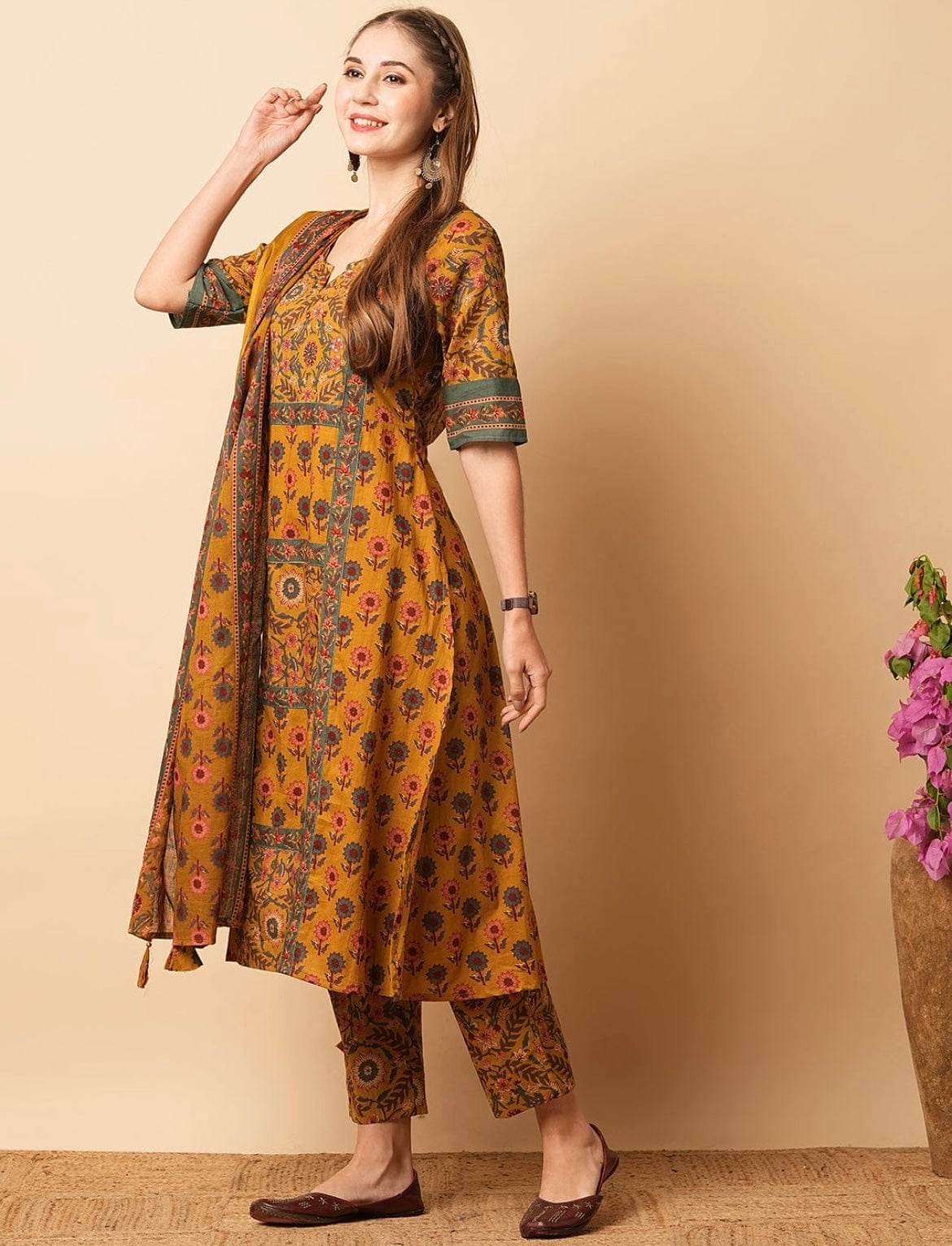 Mustard yellow floral printed panelled beads cotton kurta set - Eraya