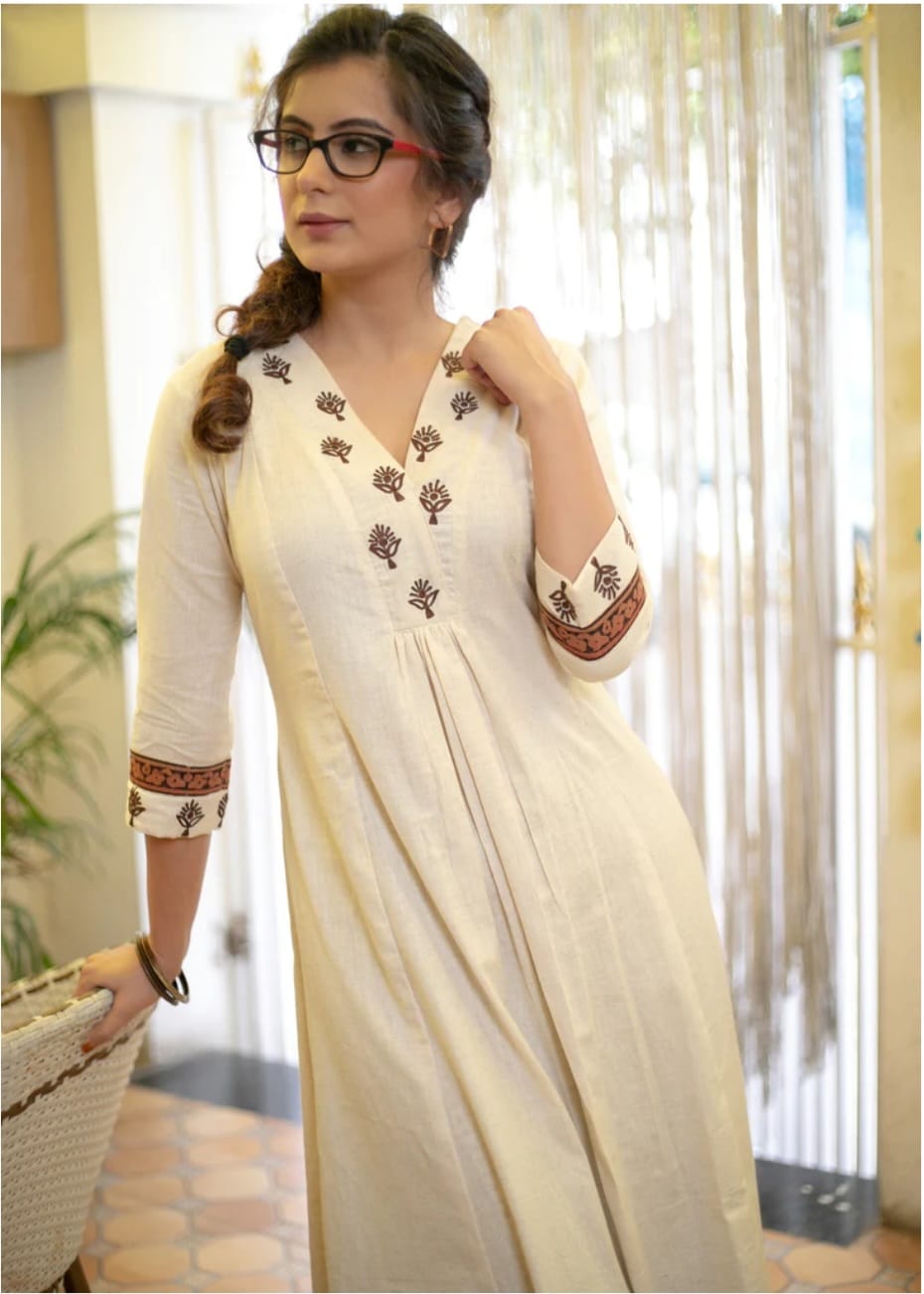 Classy Cotton Flex Off-White Kurta With Embroidered Yoke, Paired With Printed Pant