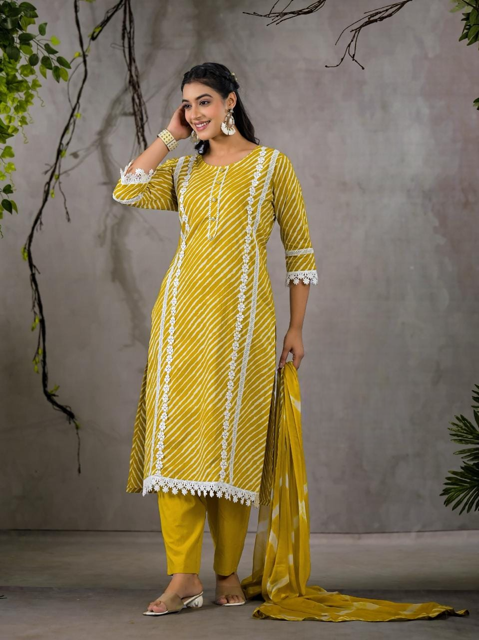 Beautiful lehriya print lace decorated three piece kurta set