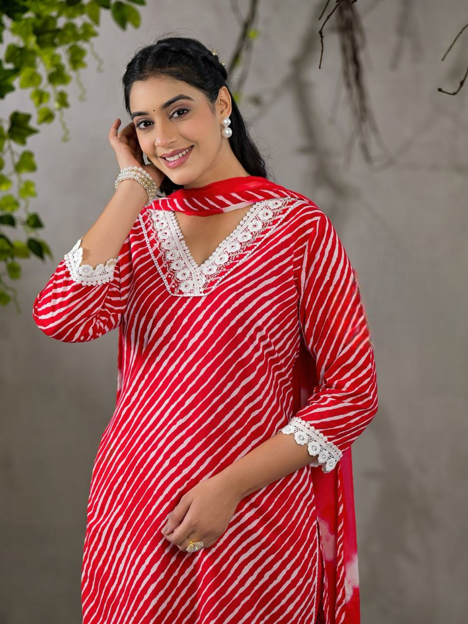 Beautiful lehriya print lace decorated three piece kurta set