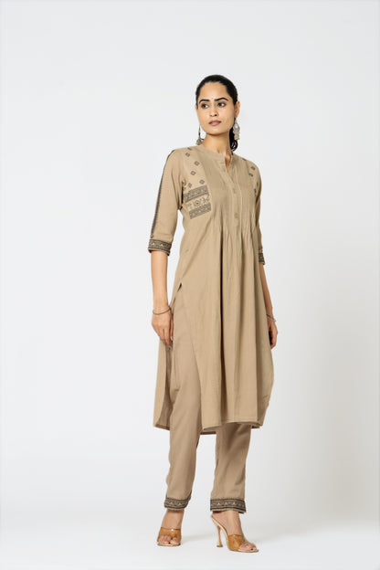 The house of khakhi: Heavy cotton front/back embroidered, pintex work kurta-pant set