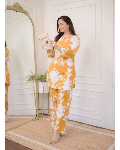 Printed yellow cotton short kurti-pant set - Eraya